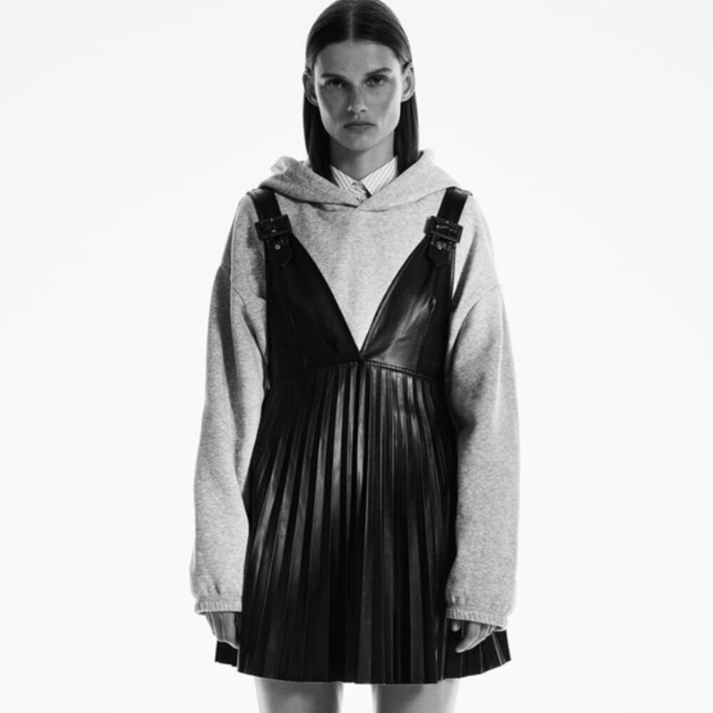 Zara | Faux Leather Pleated Pinafore with Buckles | Black